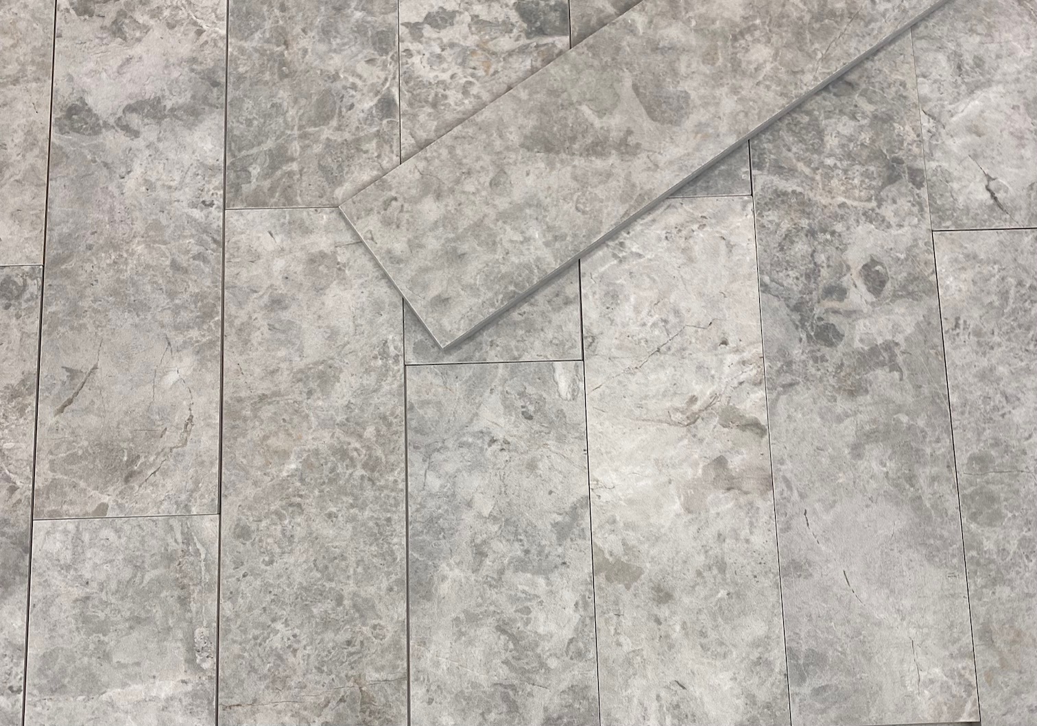 Tundra Ocean grey marble tiles with cloudy veining